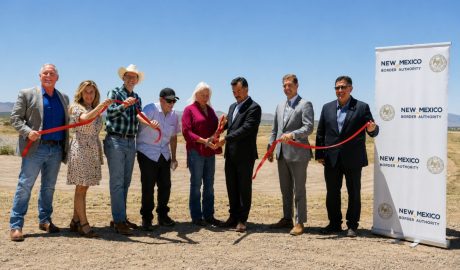 Alt Text: Officials participate in a ribbon-cutting ceremony celebrating completion of Phase 3 of the Southern New Mexico Berm Project in Columbus, New Mexico.