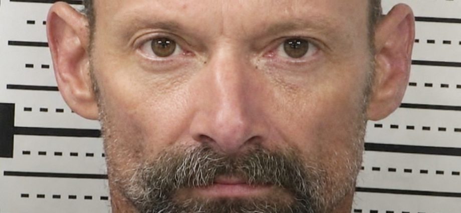 Booking photo of David J. Curtis, who was arrested on a charge related to possession of an explosive or incendiary device following reported explosions near Las Cruces.