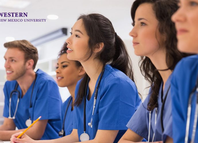 Western New Mexico University nursing students in blue scrubs participating in healthcare training and classroom instruction.