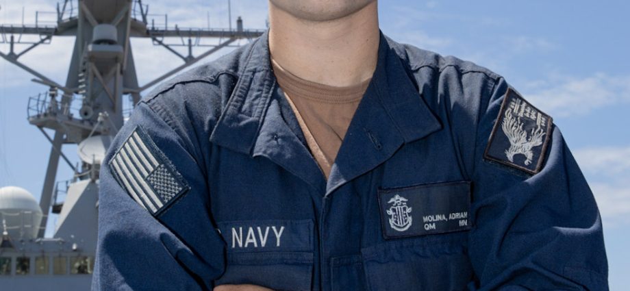 Seaman Adrian Molina of Columbus, New Mexico, aboard the USS Carl M. Levin during RIMPAC 2026 in Hawaii.