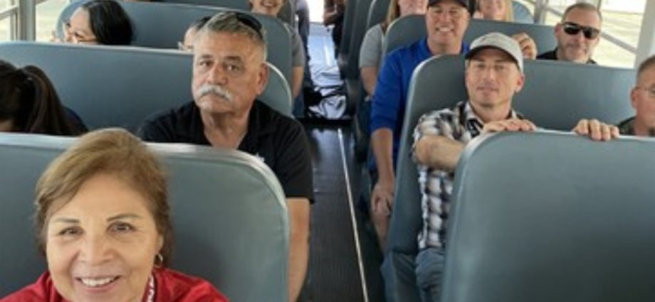 Deming Public Schools transportation employees, contracted bus drivers and safety personnel participate in S.T.A.R.T. training aboard a school bus.