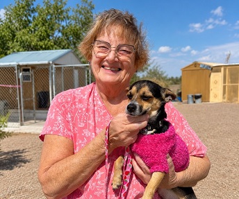 DAGSHIP Rescue adopter with a dog following an adoption event in Deming.